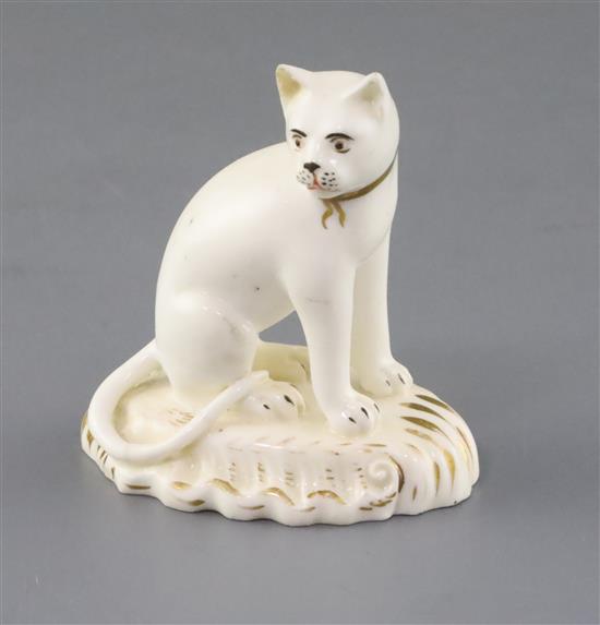 A rare Rockingham porcelain figure of a seated cat, c.1830, H. 6.1cm